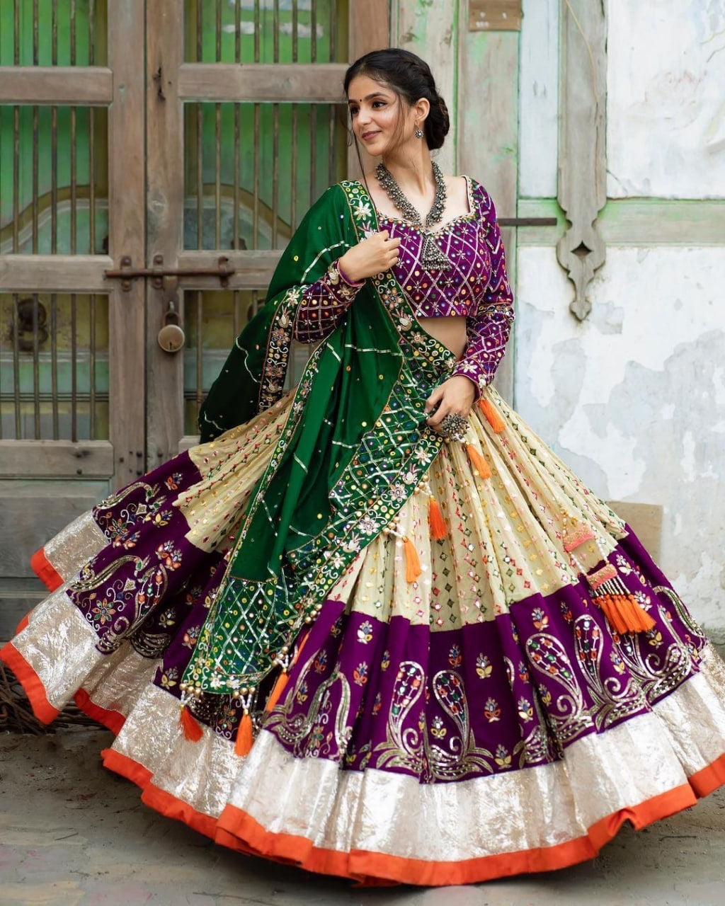 Cream Purple Lehenga Choli With Mirror Work And Attached Green Dupatta