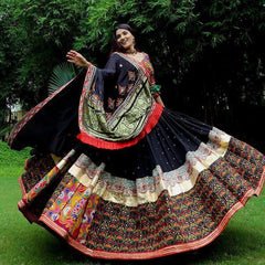 Black Orange Lehenga Choli With Mirror Work And Attached Black Dupatta