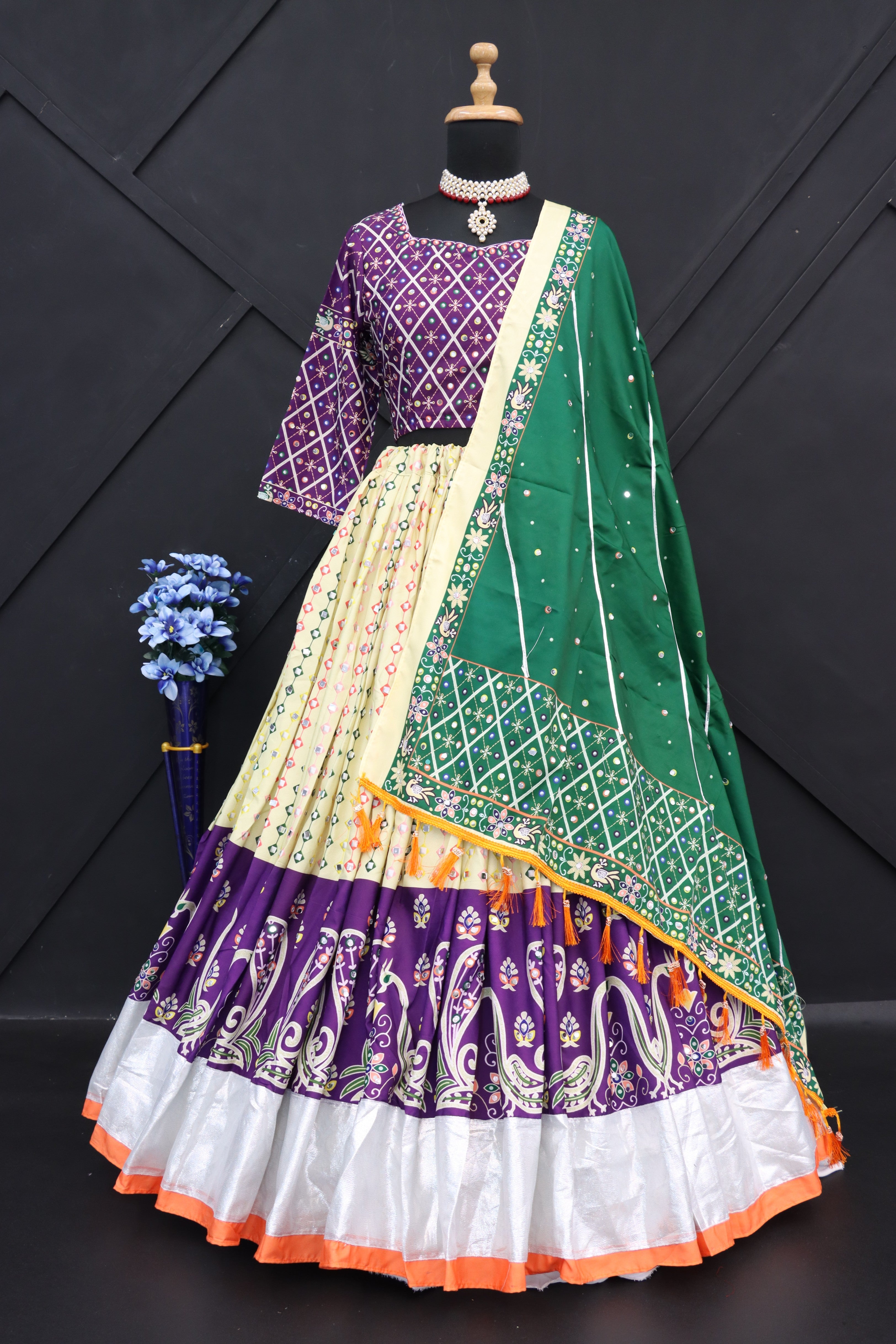 Cream Purple Lehenga Choli With Mirror Work And Attached Green Dupatta